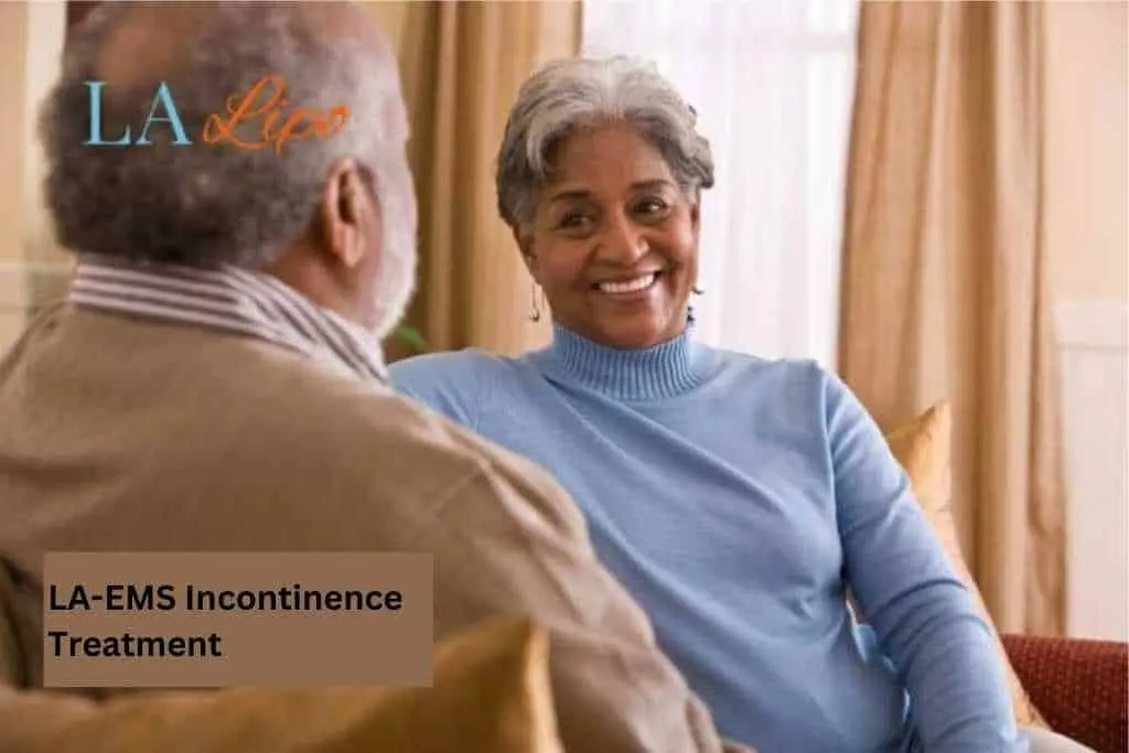 Couple sat smiling at each other - LA-EMS treatment Isle of Isla